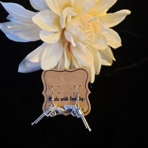 Gun shaped metal earrings